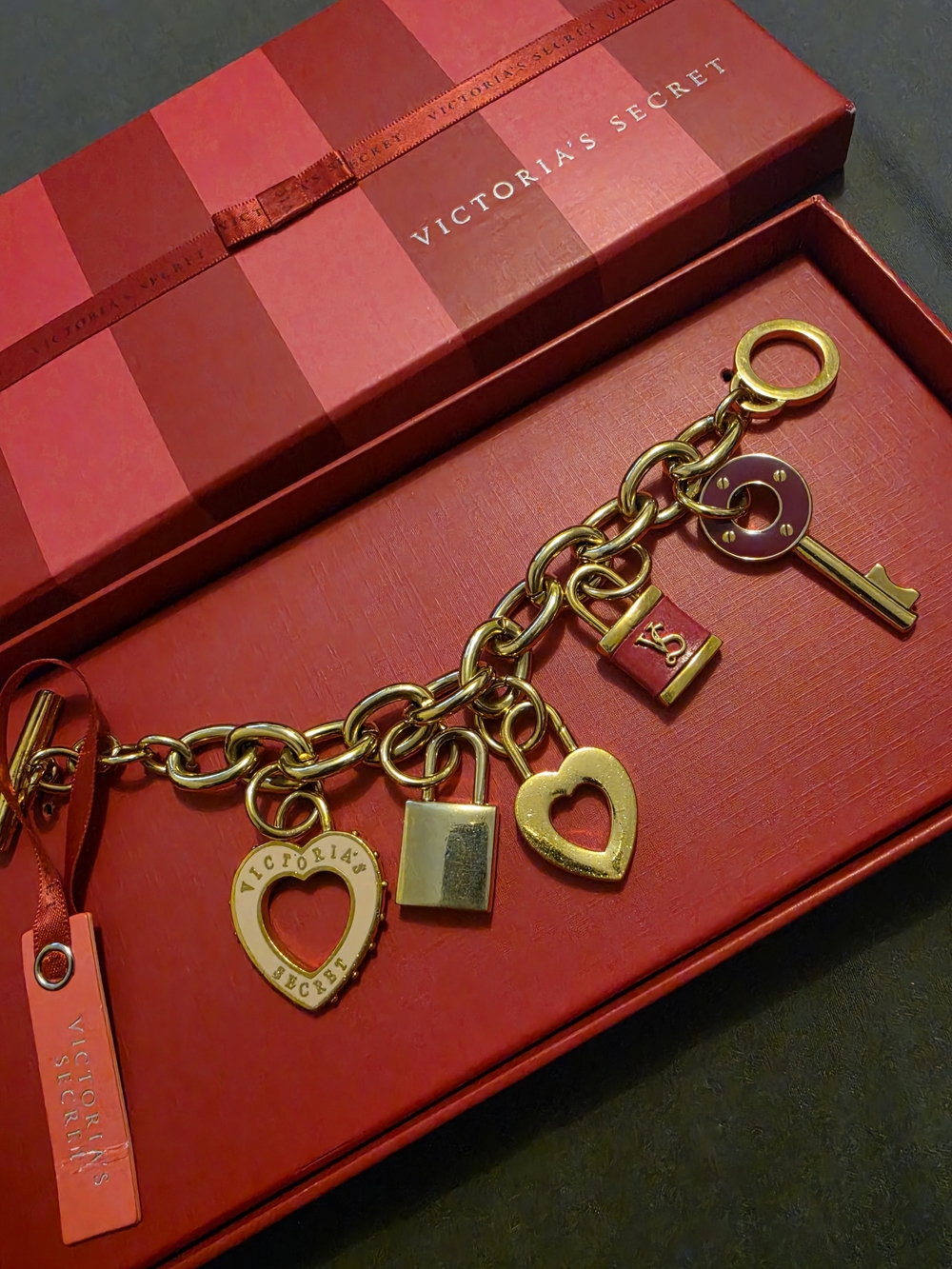 Victoria's Secret Gold Charm Bracelet with Red Accents
